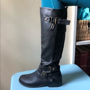Tall black riding boots